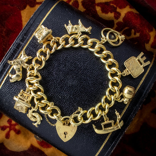 Vintage Charm Bracelet Silver 18ct Gold Gilt 9 Charms Dated 1977
