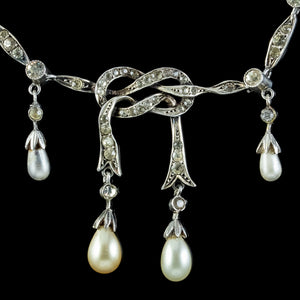 Antique Edwardian Pearl Paste Love Knot Lavaliere Necklace Silver Circa 1905 close
