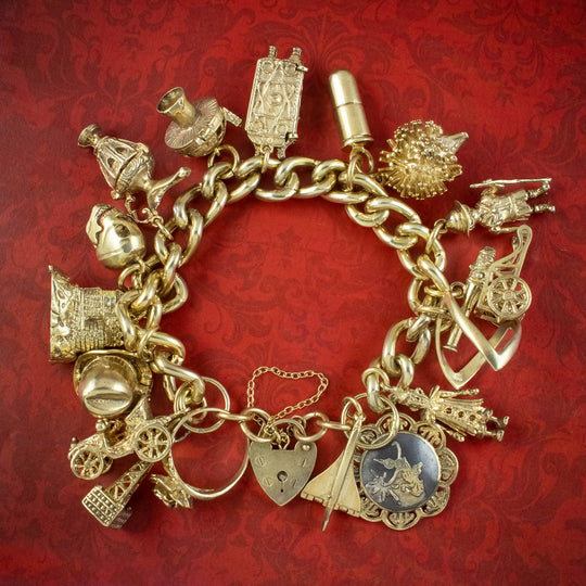 Vintage Curb Gate Bracelet With Seventeen Charms Silver Gilt